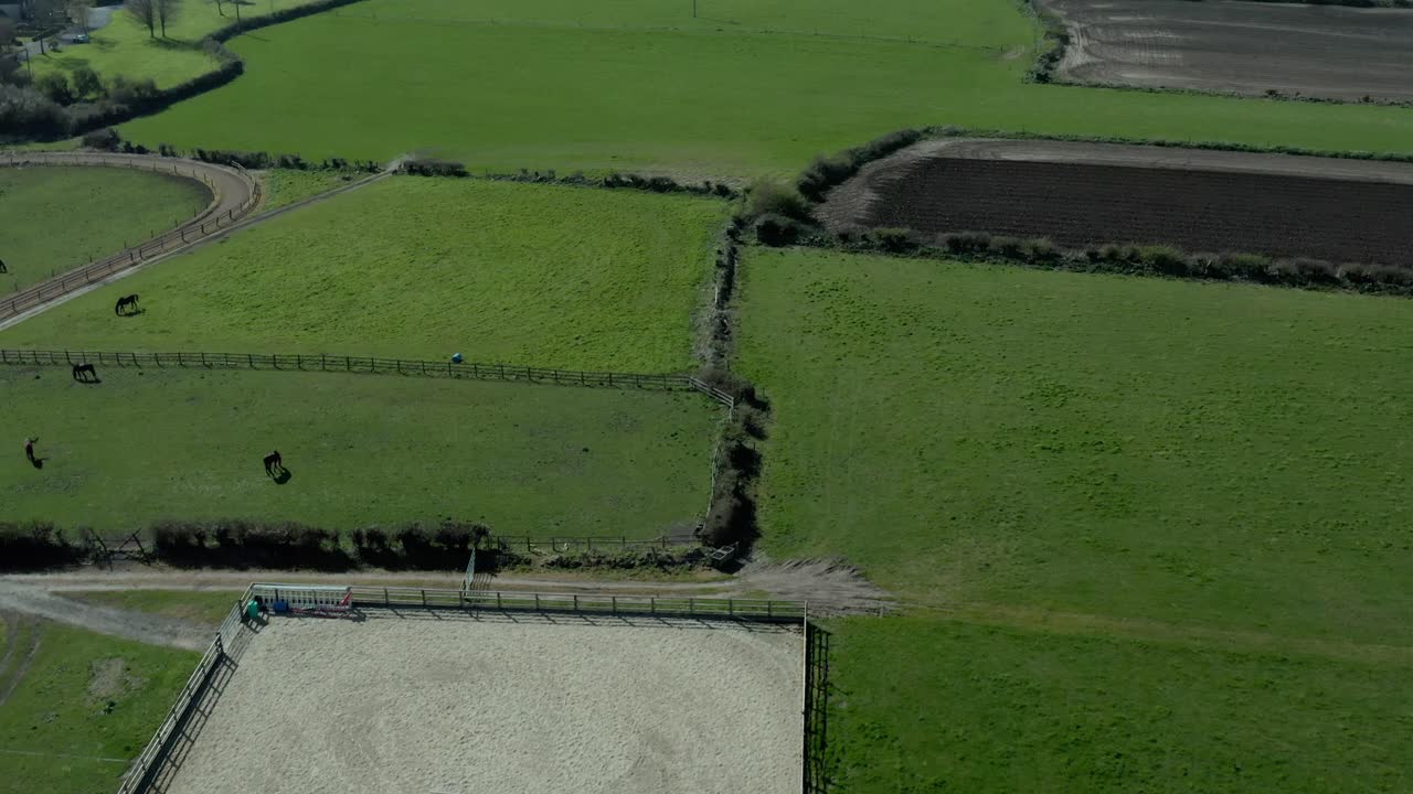 Aerial wide angle of green field at rural area at day, no people