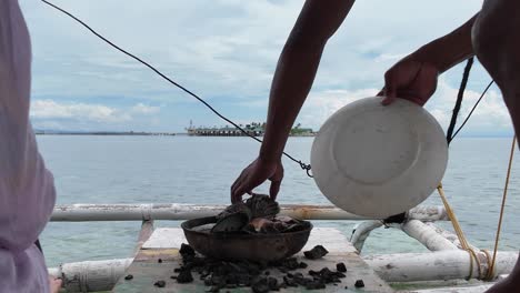 cocking seafood in boat 3