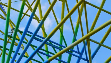 metallic multi-colored construction of a ferris wheel.