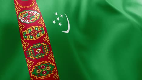 animation of the national flag of turkmenistan, green field with white crescent, five stars, and distinctive red carpet band, waving gently in the wind