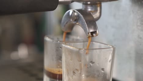 coffee pouring from espresso machine 60p
