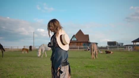 happy woman running in paddock on farm