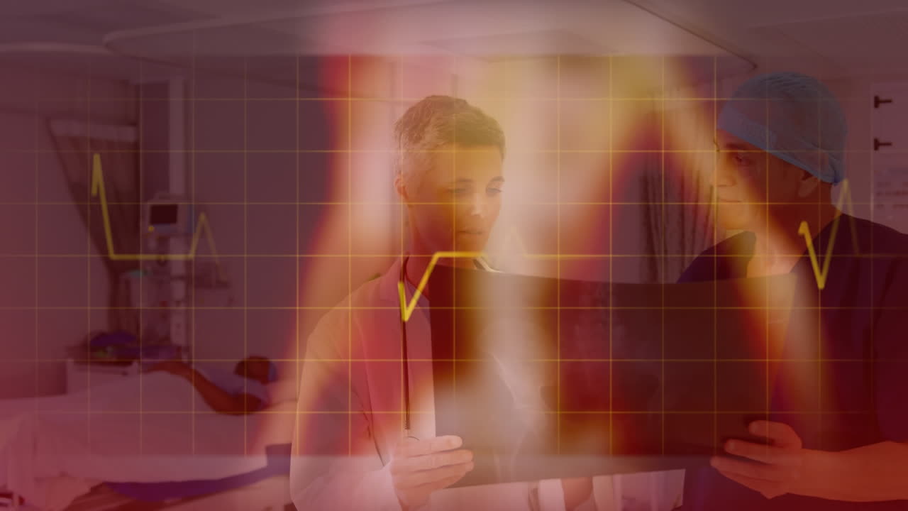 심장 박동 모니터와 여성 의사와 남성 외과 의사가 스레이 영상을 검사합니다.