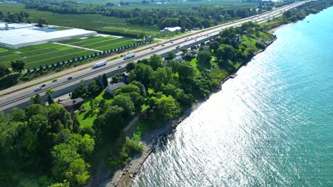 aerial view queen elizabeth way road next to lake ontario in canada