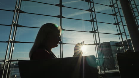 woman waiting at airport