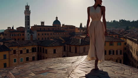 elegant woman overlooking historic siena cityscape at sunset