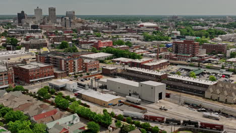 memphis tennessee aerial v55 low flyover south bluffs gated residential neighborhood, drone fly along the main street leading to downtown cityscape views - shot with mavic 3 cine - may 2022