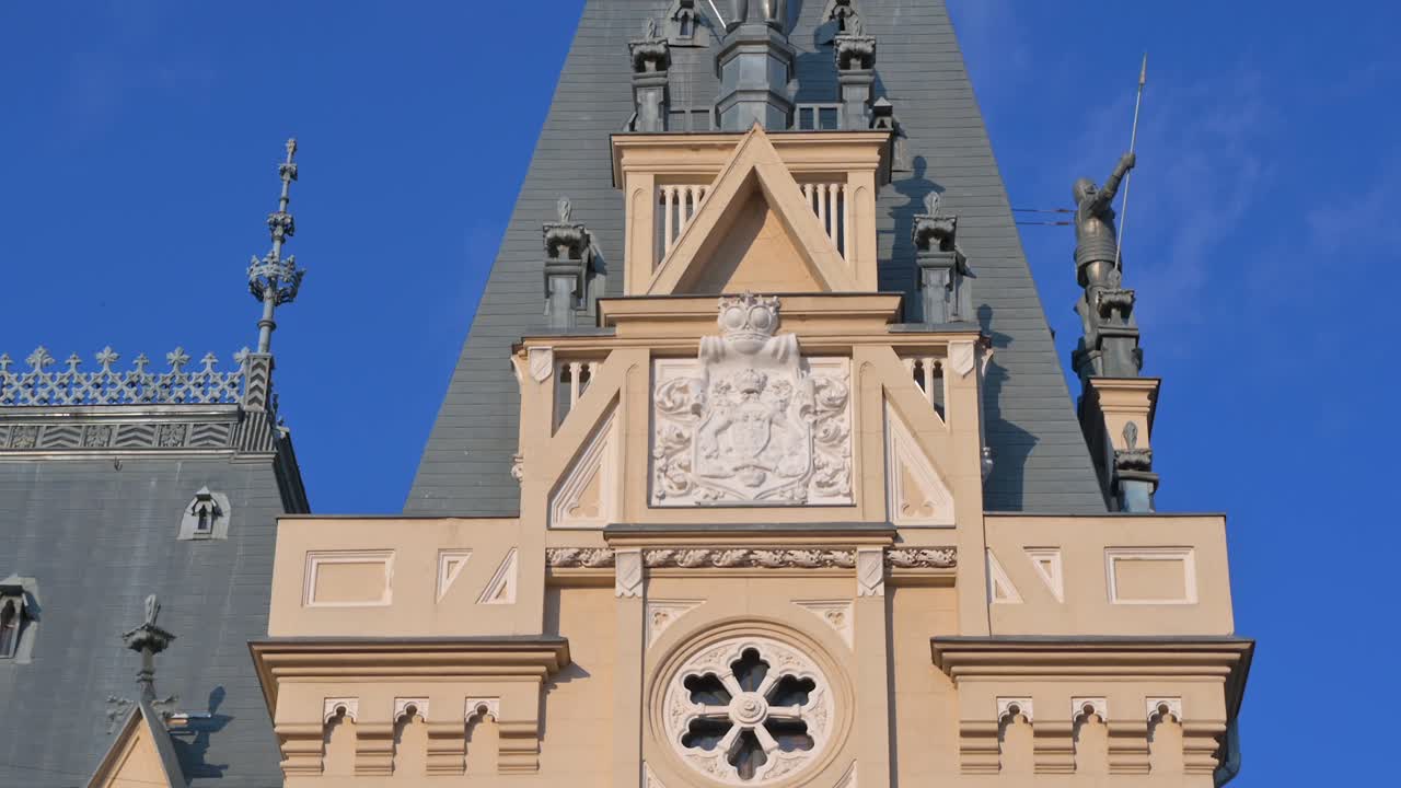 Iasi, Romania - April 25, 2021: Close up of pink magnolia trees in front of the Palace of Culture