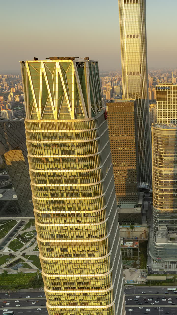 Timelapse of the Beijing city skyline from a high vantage point in vertical