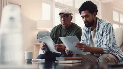 father and son discussing finances