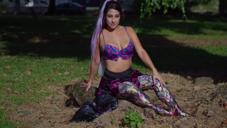 Young-woman-enjoys-a-sunny-day-at-the-park-with-her-roller-blades