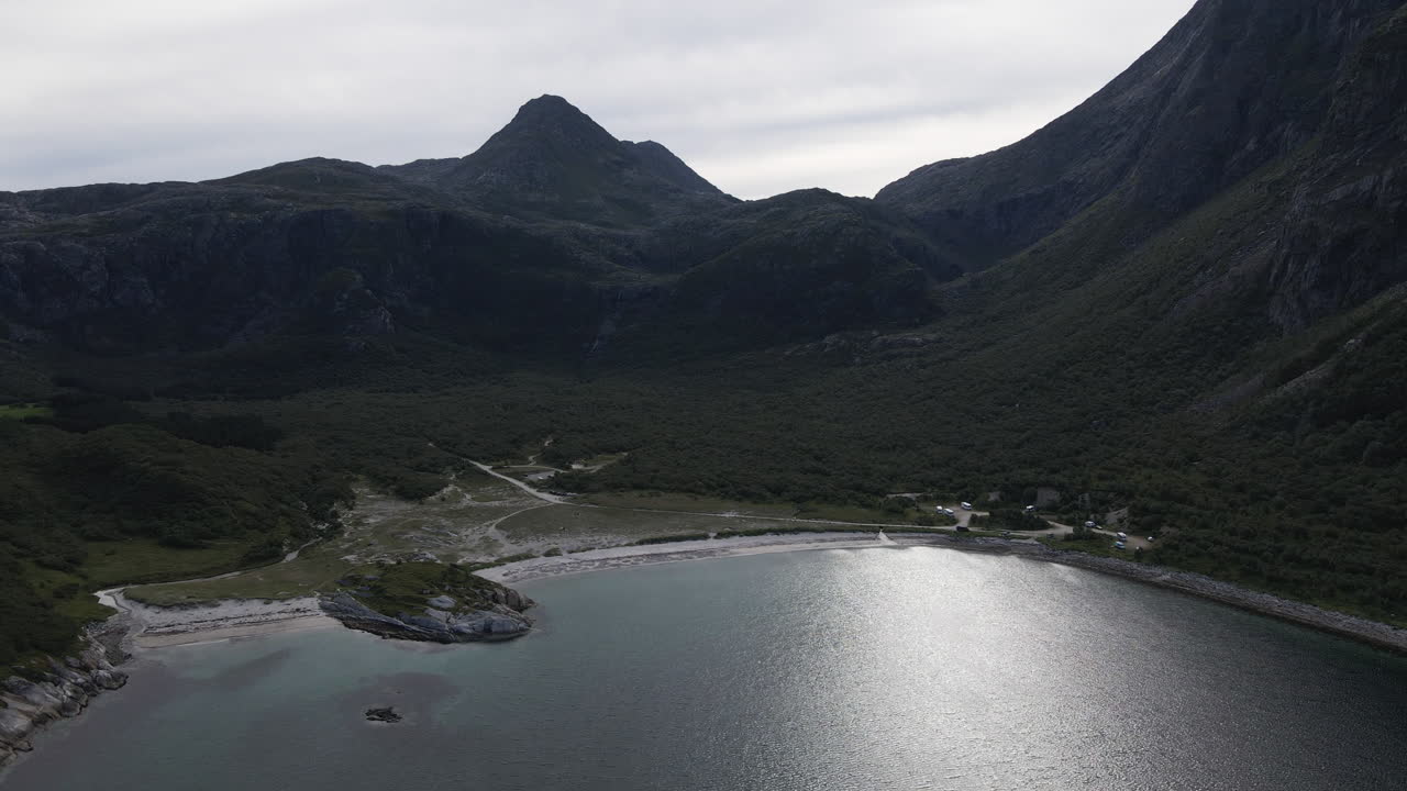 Mountain Landscape And Tranquil Beach In Breivika, Dønna, Norway - aerial drone shot