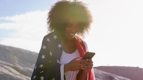 Animation-of-network-of-connections-over-woman-using-phone-on-the-beach