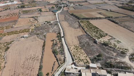 Aerial-drone-video-from-western-Malta,-Mgarr-area,-Fomm-ir-Rih-bay