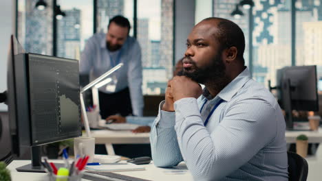 day trader analyzes stock market, doing thinking for buy and sell decisions