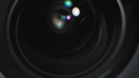 camera lens aperture close-up. aperture blades opening and closing during shooting