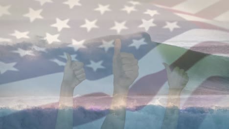 Animation-of-flag-of-united-states-blowing-over-seascape-and-hands