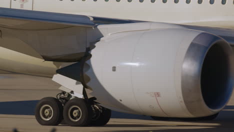 close-up of airplane engine and landing gear