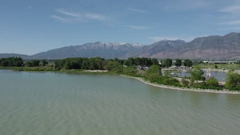 beautiful shoreline of utah lake during summer in utah county, aerial drone