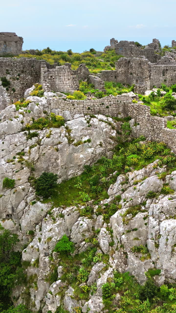 Aerial, drone view of the Haj Nehaj Fortress in Sutomore, Montenegro. Vertical