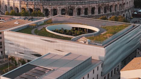 Aerial-revealing-shot-of-the-audience-starting-to-wait-for-the-event-at-the-Nimes-Arena