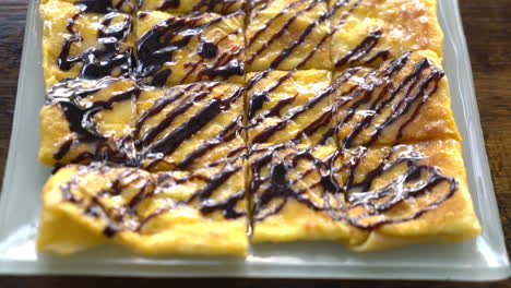 roti with chocolate sauce on plate