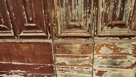 close-up of weathered wooden door panels