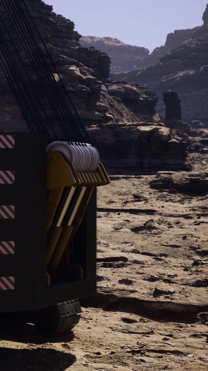 Heavy machinery operates on rocky terrain in a remote location during daylight