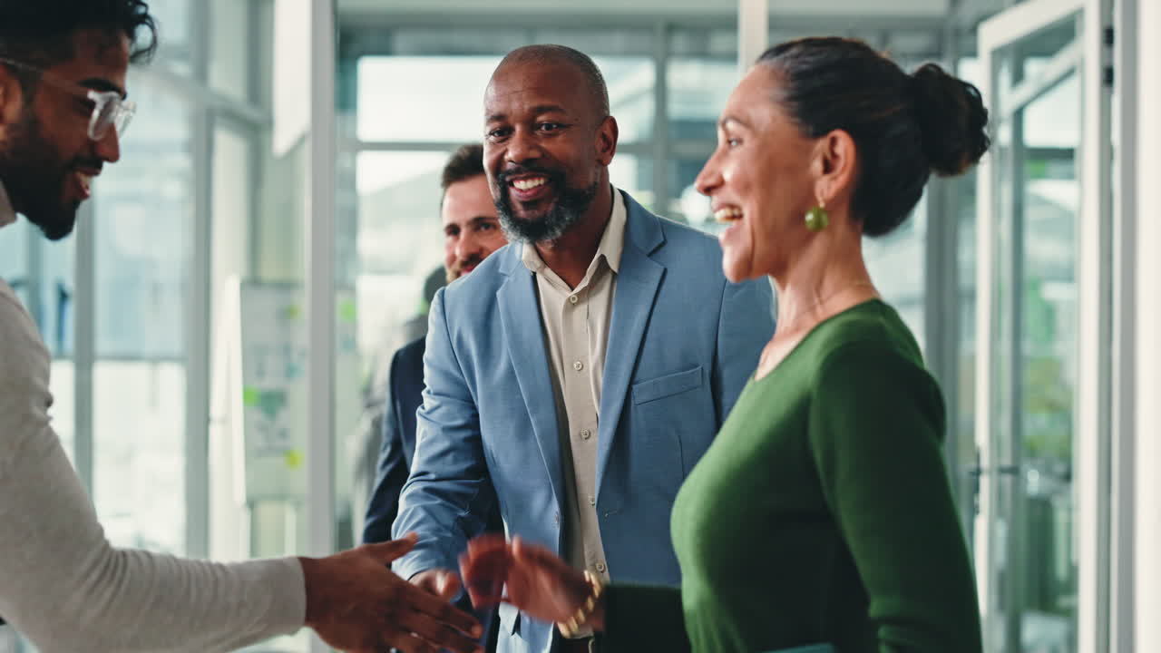 Business people shaking hands at a meeting