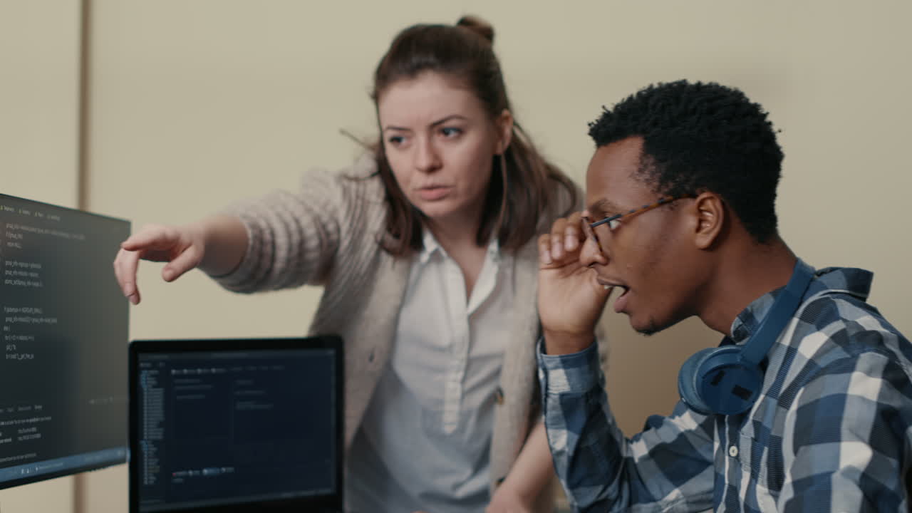 System engineers celebrating successful code compiling doing high five hand gesture