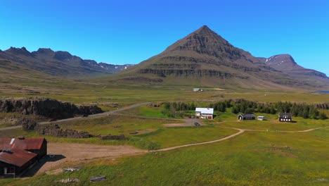 immerse yourself in the beauty of djúpivogur’s mountains, with the drone capturing their grandeur and the serene landscapes that surround them.
