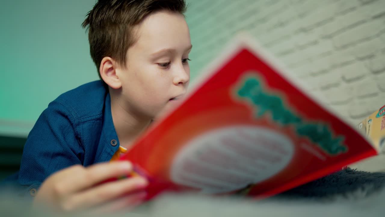 Self isolation concept. Young boy studying from home during Covid-19. All stay at home. Remote studying from home during Quarantine.