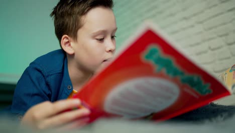 self isolation concept. young boy studying from home during covid-19. all stay at home. remote studying from home during quarantine.