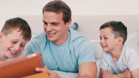 Father,-kids-and-smile-with-tablet-in-bedroom