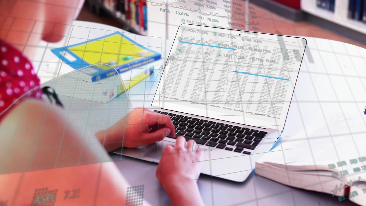 Student placing hands on keys and typing, animating charts over laptop spreadsheet while studying