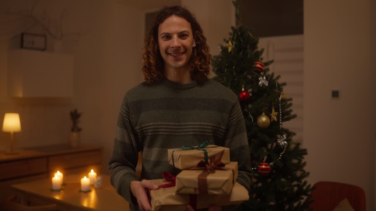 Man holding christmas presents