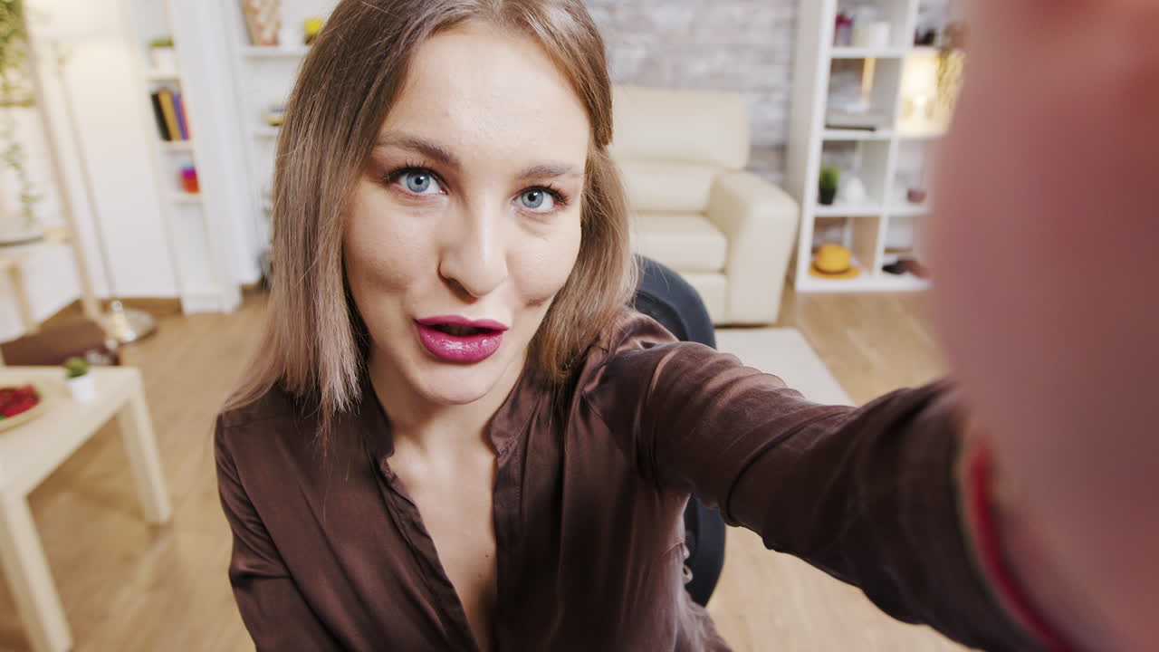 Selfie portrait of a woman indoors