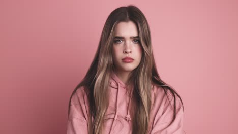 disappointed young woman moving head sideways in room