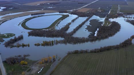 aerial shot of the red river flooding in fall near morris manitoba as a result of freak winter storm