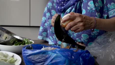 Hands-Of-Elderly-Muslim-Women-Sat-On-Floor