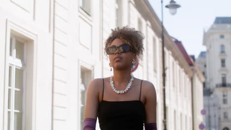 Young-fashionable-african-woman-walking-down-the-street