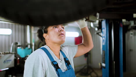 Woman-inspecting-automobile