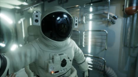 astronaut inside the orbital space station