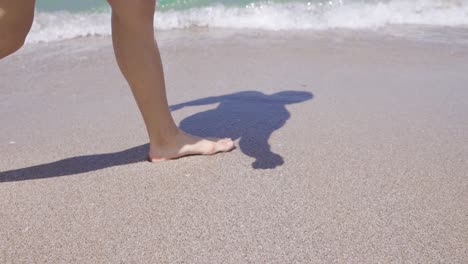 walking on the beach in slow motion.