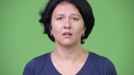 beautiful woman with short hair looking shocked
