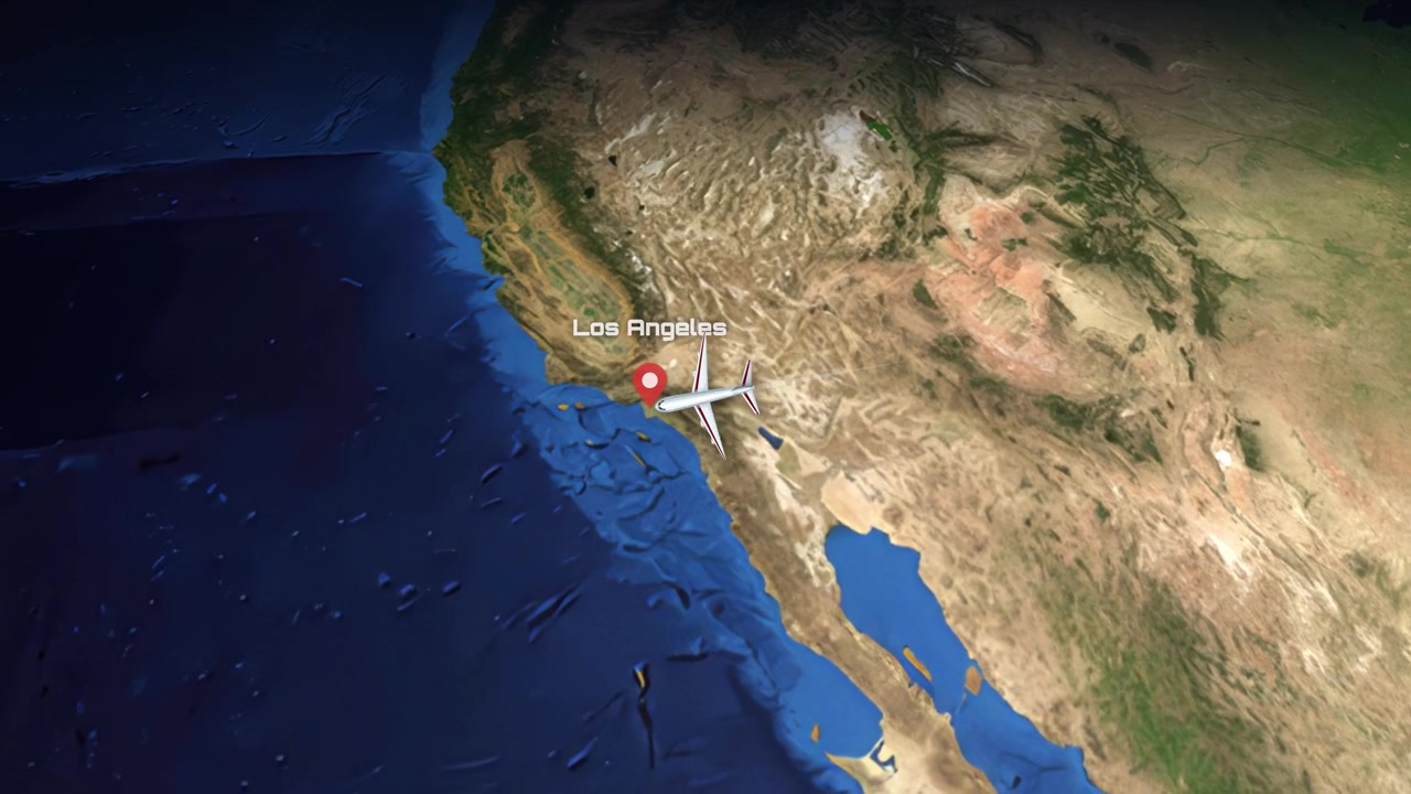 Satellite view animation follows a commercial airplane flying across the United States from east coast