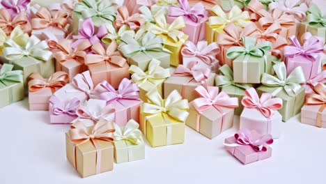 colorful pastel gift boxes with ribbons