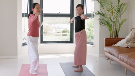 yoga, fitness and asian mother with child at home