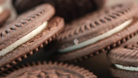 close-up of chocolate cream filled cookies