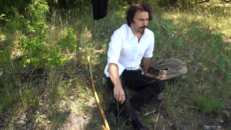 hungarian poet sandor petofi sits in shady spot during hike to rest